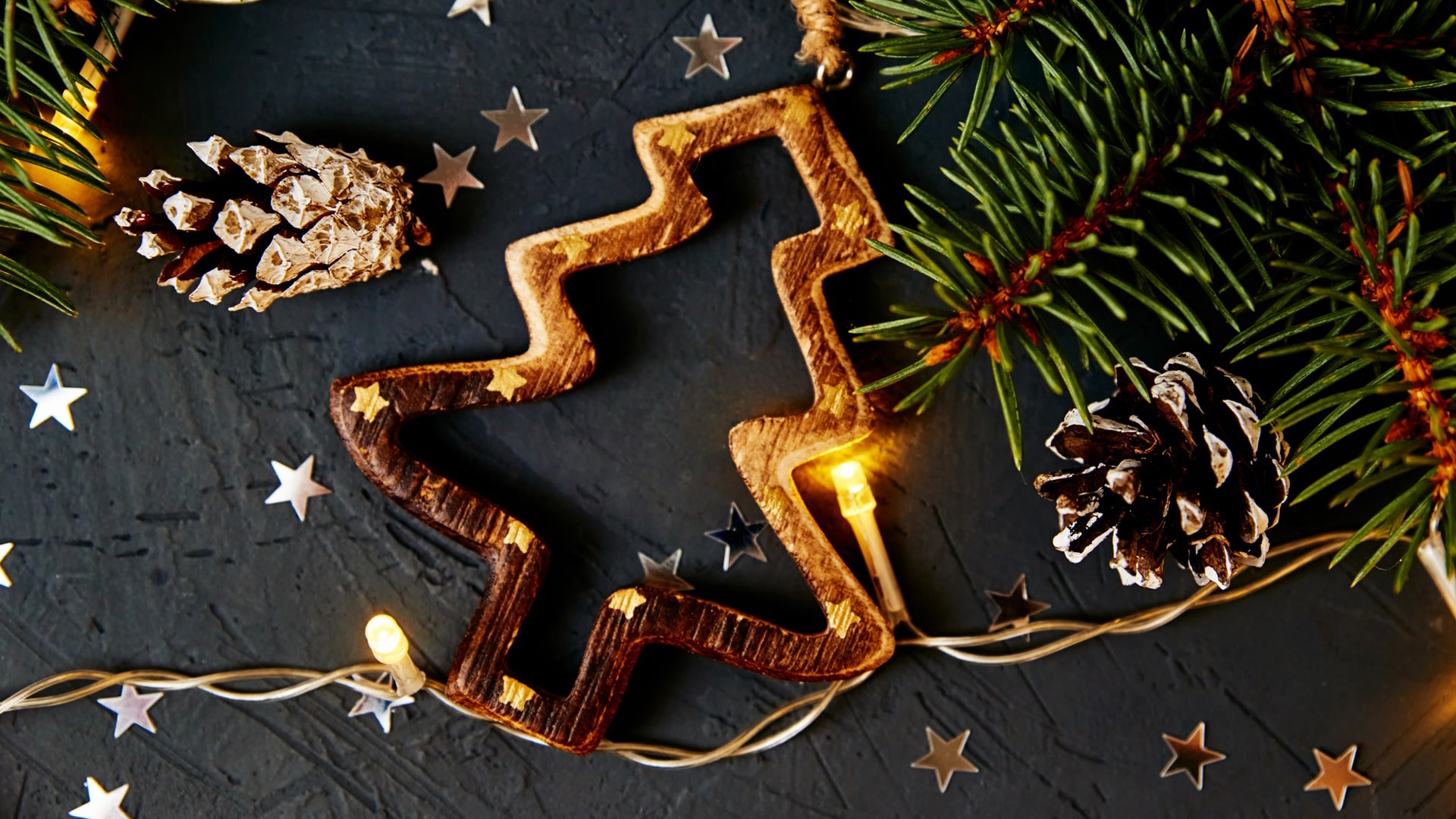 christmas-decorations-on-dark-background-top-view