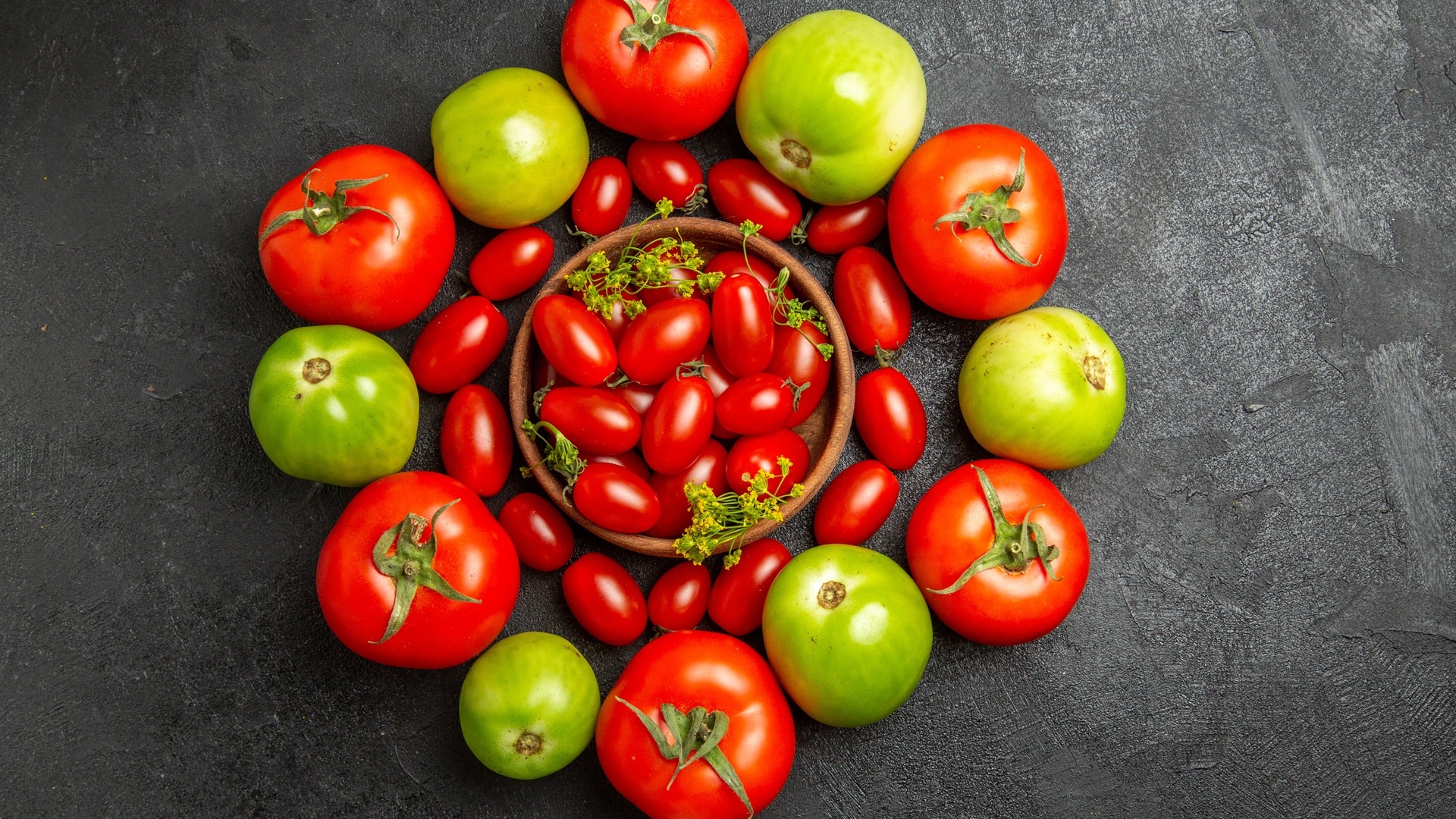 top-view-cherry-red-and-green-tomatoes-around-a-bo